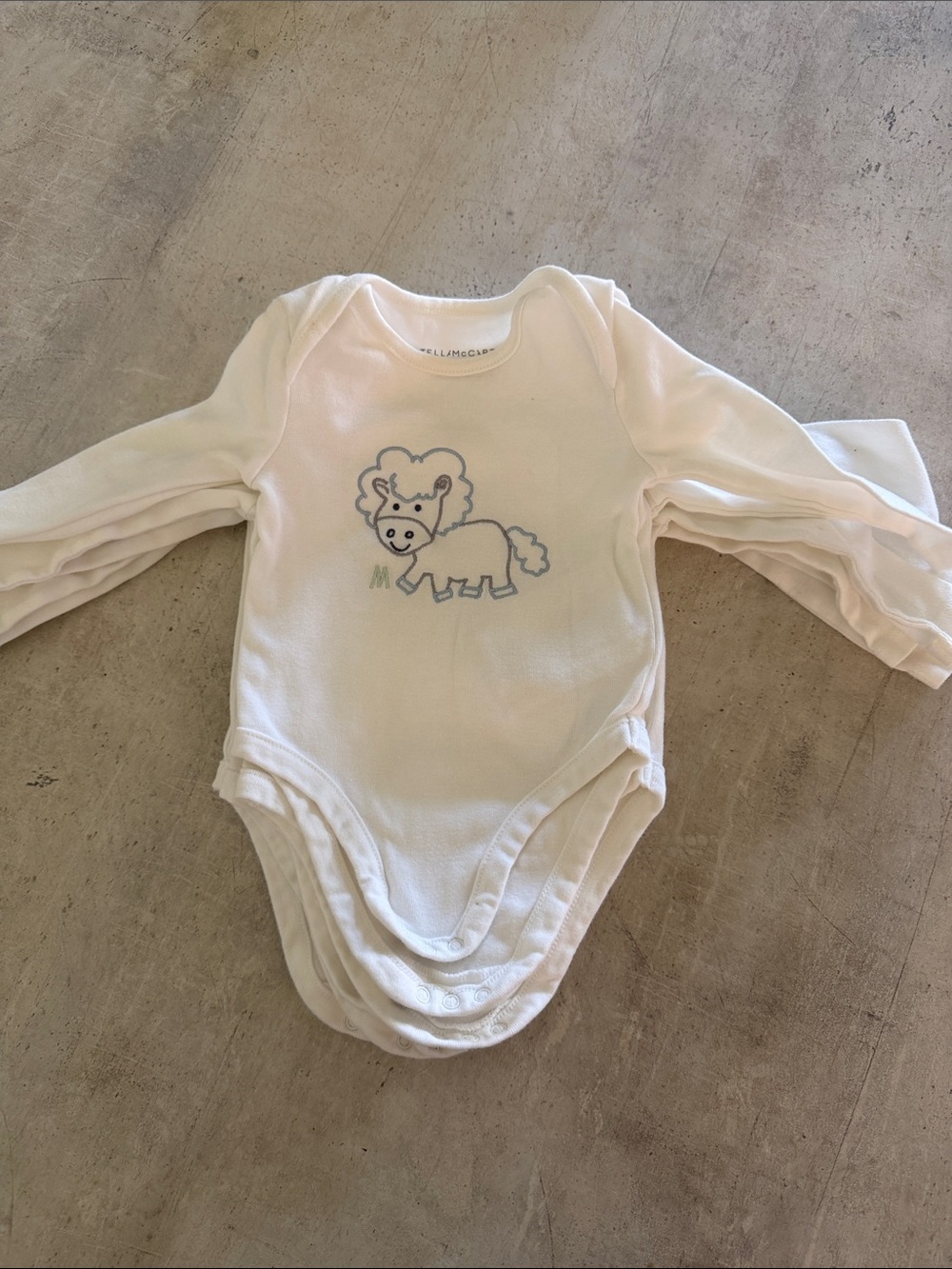 Stella Mc Cartney  Baby Bodysuit with horse motif ( days of week, complete se